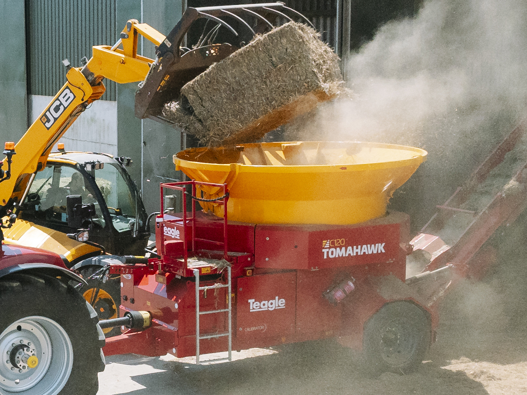 4x5 C120 and tractor loading bale image edited